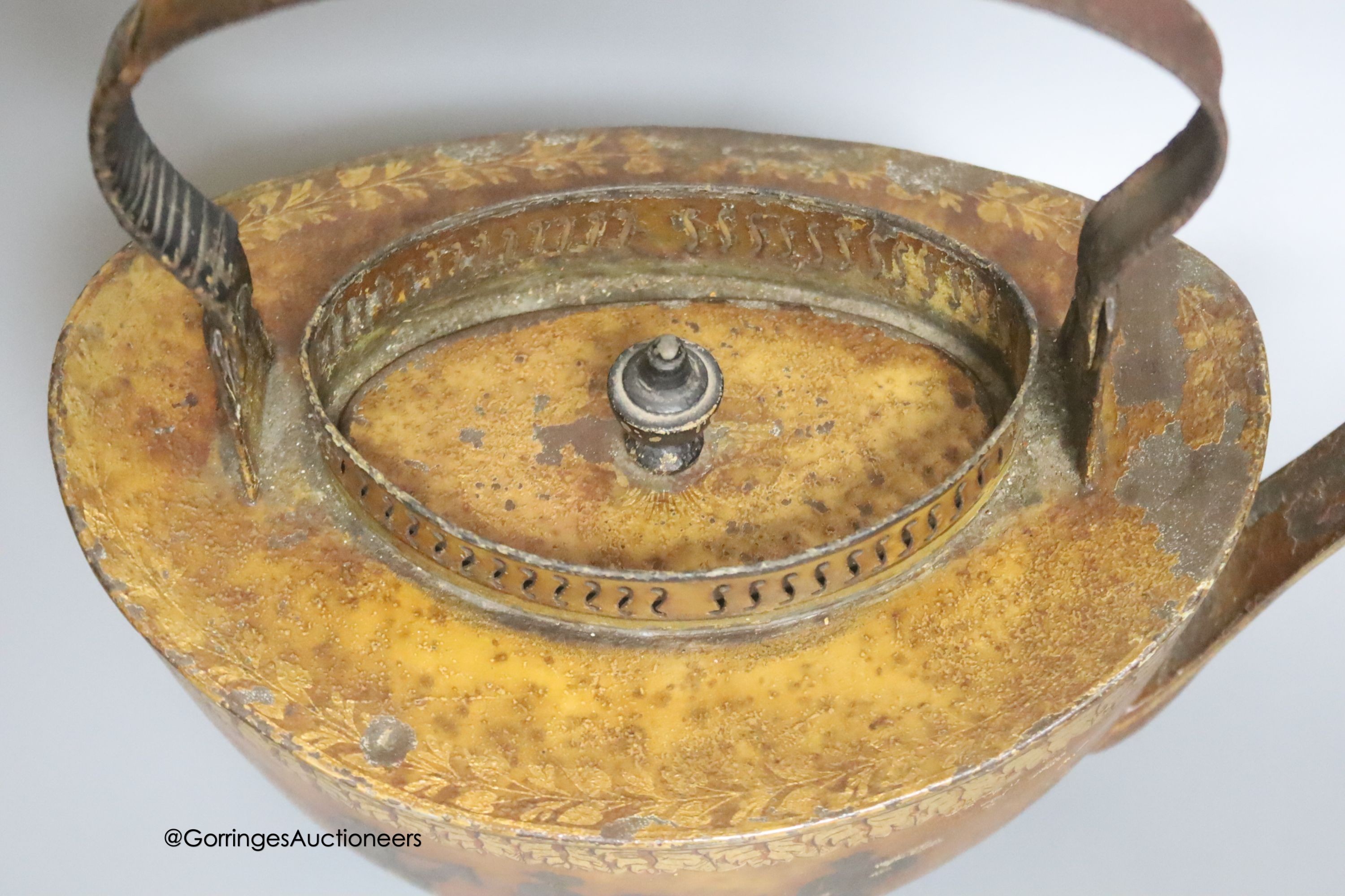 A 19th century Pontypool toleware tea kettle, length 31cm